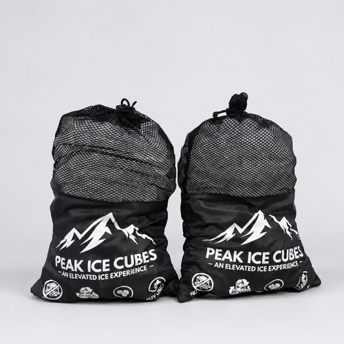 Two bags of PEAK Ice Cubes on a clean studio background