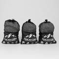 Three bags of PEAK Ice Cubes on a clean studio background